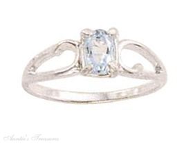 Solitaire Oval Blue Topaz Ring