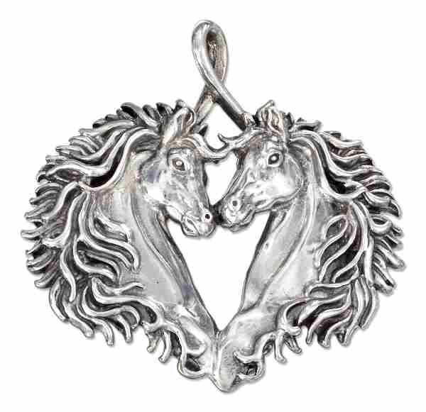 Horseheads Making A Heart Pendant Horseheads Making A Heart Pendant